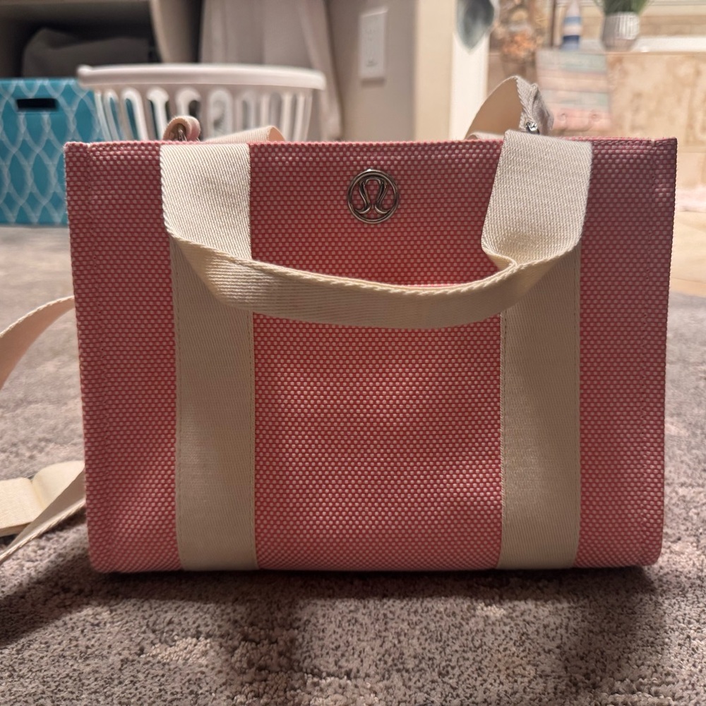 Lululemon pink and white cross body/shoulder bag.